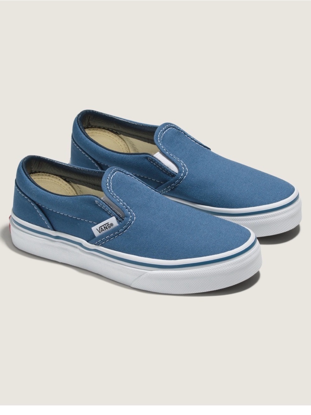 Vans Slip-On Canvas Sneakers in Denim Blue